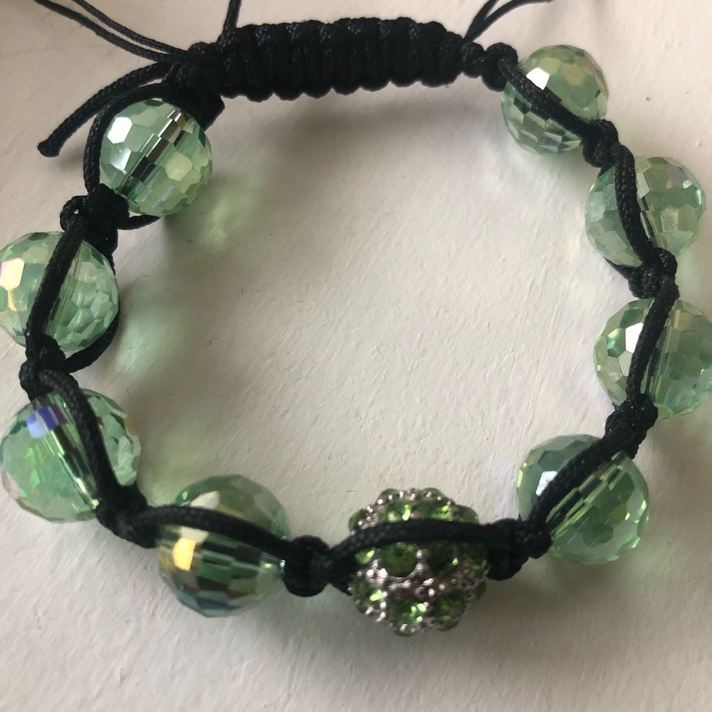 Green bracelet with tie